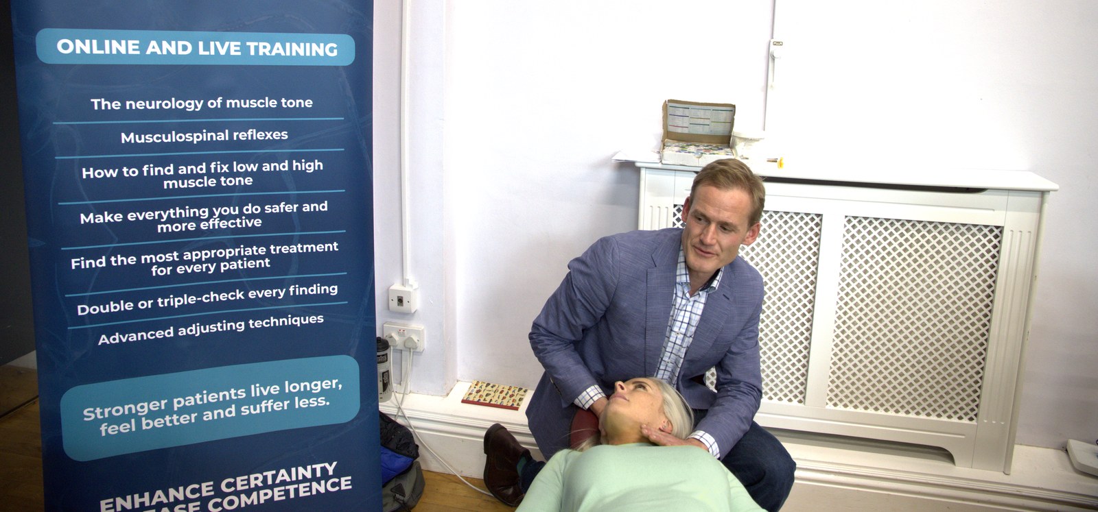 Patrick Thomas teaching an Afferentology seminar — demonstrating cervical assessment technique